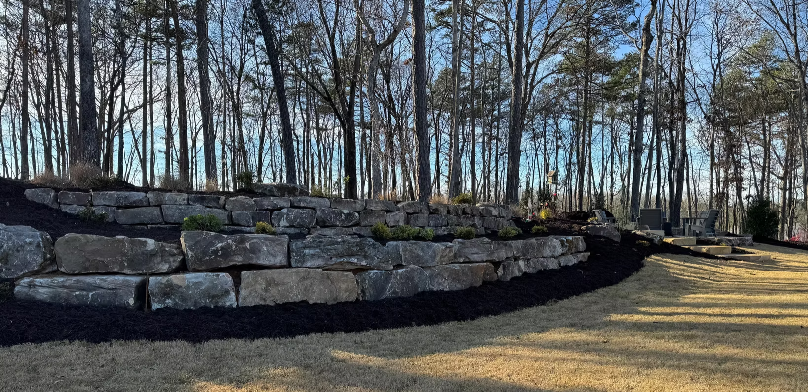Natural stone boulder retaining wall